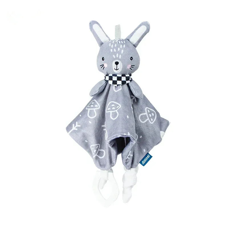 doudou lapin de couleur bleu avec des motifs de champignons