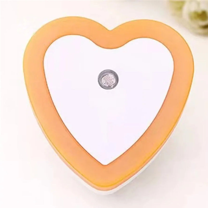 Veilleuse orange en forme de cœur