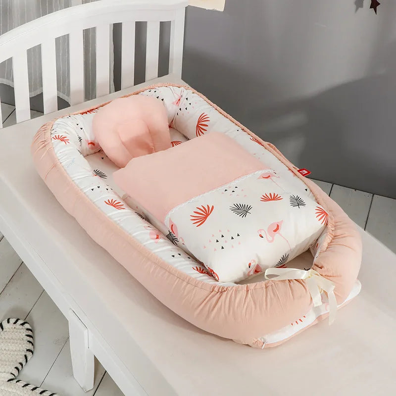 le nid bébé - Orange Corail pour un confort ultime et une sécurité renforcée à votre bébé.