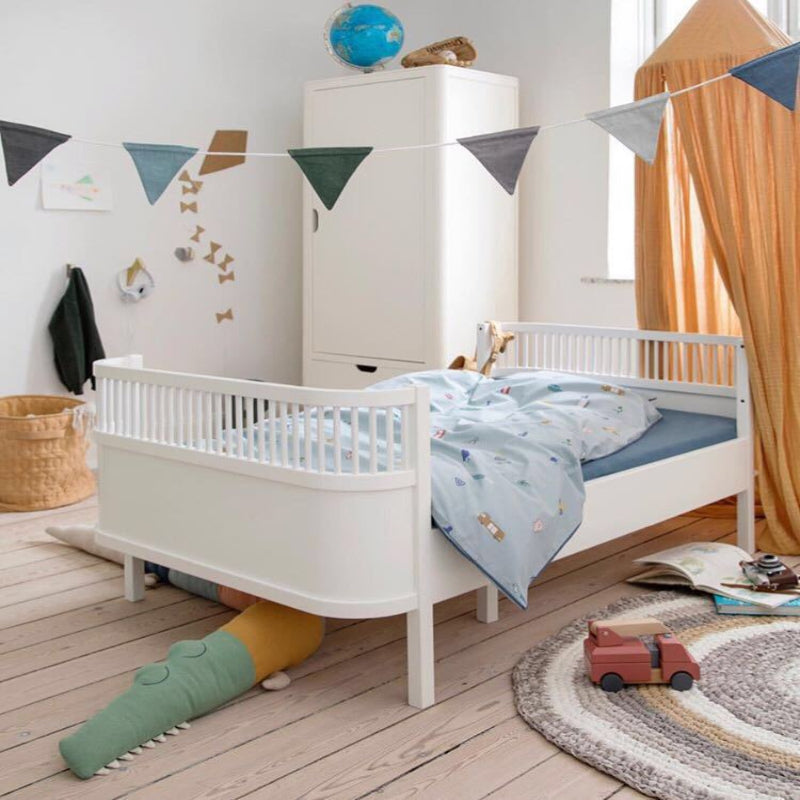 Un tour de lit douc et protecteur our berceau bébé,