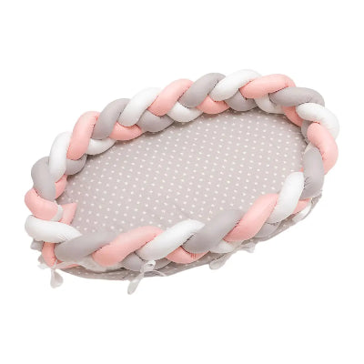 Reducteur de it-rose en coton avec un contour tressé