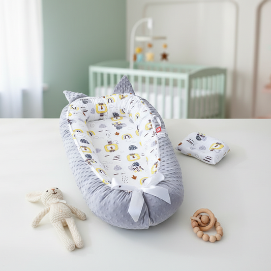 Cocon bébé gris chambre 