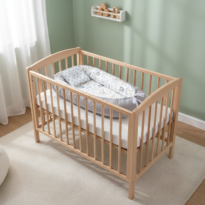 réducteur de lit bébé