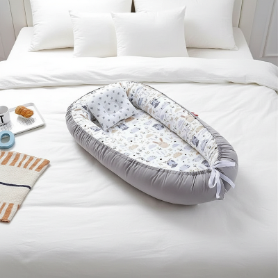 réducteur de lit bébé chambre parents