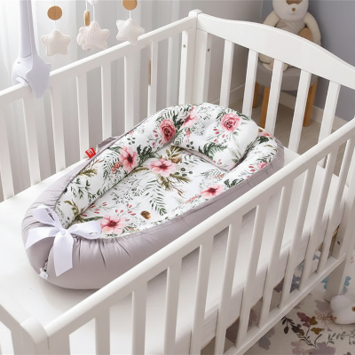 réducteur de lit bébé