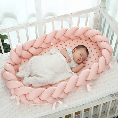 réducteur de lit bébé tressé