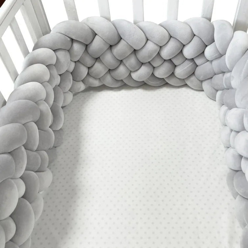 tresse de lit bebe gris six brins  dans berceau