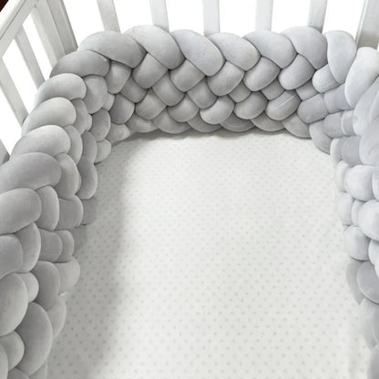 tresse de lit bebe gris six brins  dans berceau