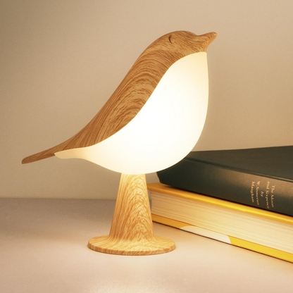 Une veilleuse en bois forme oiseau pour une chambre de bébé et d'enfant