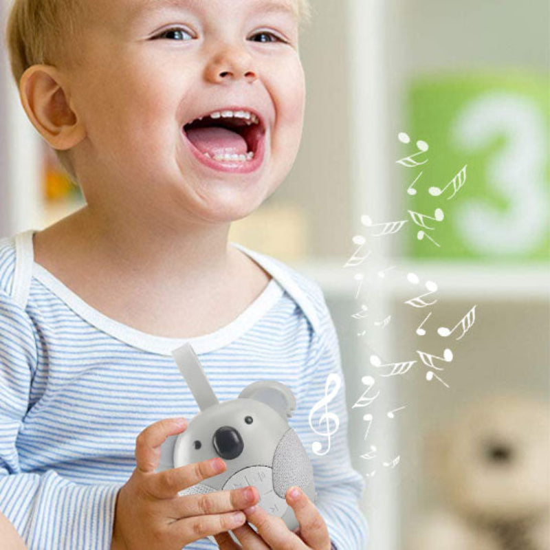 Veilleuse bruit blanc dans la main de garçon heureux