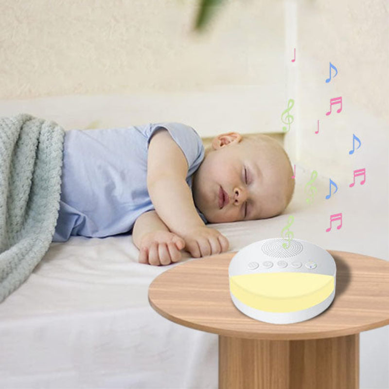 Veilleuse bruit blanc sur la table bebe dort